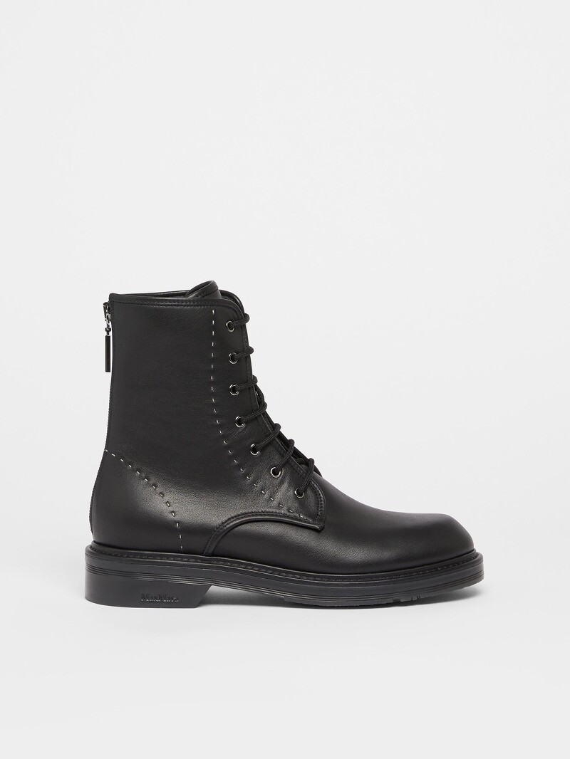 Max Mara 黑色皮革踝靴,NT27,800。