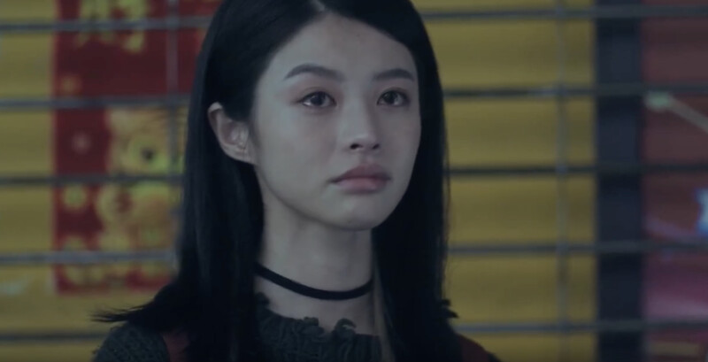 試圖忍住眼淚的邱曖。