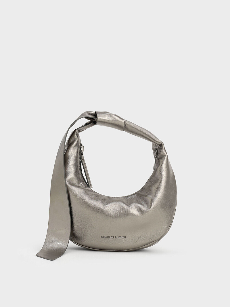Toni 小型軟扭結流浪包 $1,890