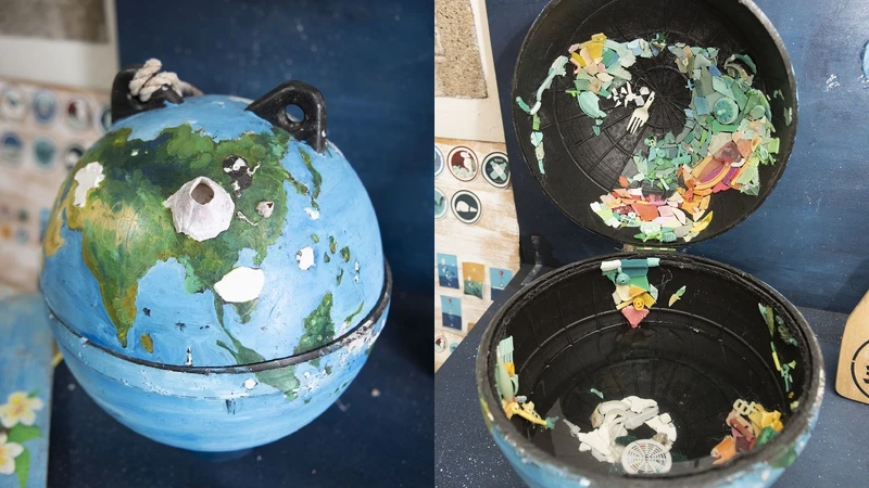 由海洋廢棄物（浮球、塑膠碎片等）做成的地球，是唐采伶到學校進行環境教育時的好幫手。