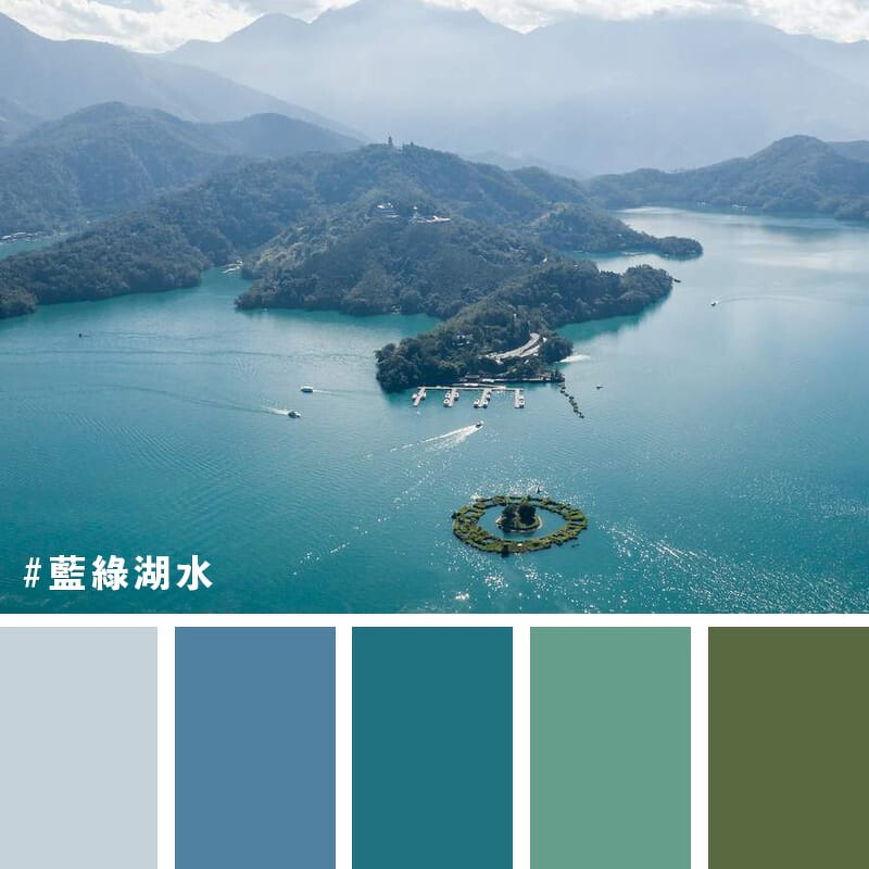 山脈環繞日月潭的藍綠色湖水。 山脈環繞日月潭的藍綠色湖水。