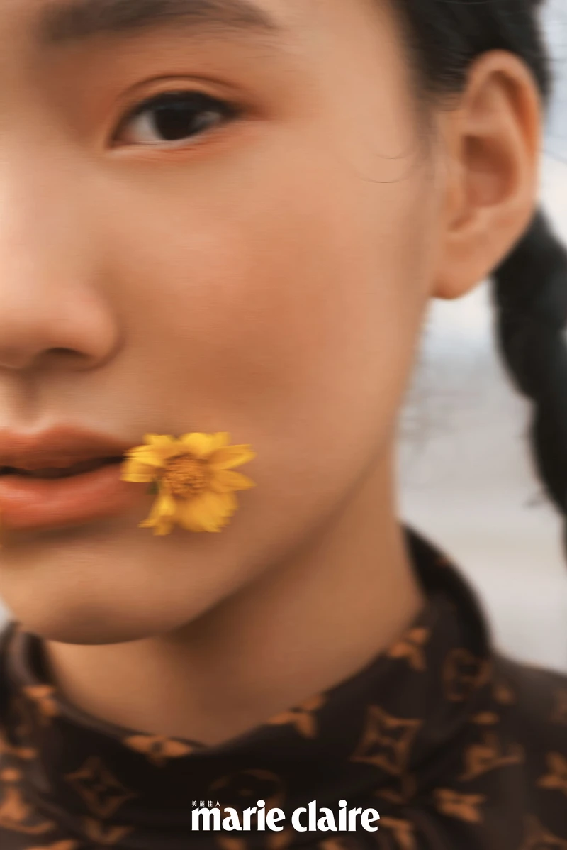 Monogram 印花高領上衣，by Louis Vuitton。