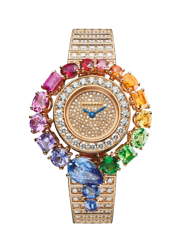 BVLGARI SERPENTI INCANTATI RAINBOW腕錶 機芯 寶格麗專屬石英機芯；刻有BVLGARI logo；防水深度30公尺。 錶殼與錶盤 錶徑33MM，黃K金錶殼，鑲飾3顆圓形、橢圓形和方形切割深至淺綠色沙弗萊石(總重約 1.67 克拉)，3 顆顏色由黃至橘的圓形、橢圓形和長方形切割橘黃色剛玉(總重約 1.38 克拉)，1 顆圓形切割錳鋁榴石，2 顆圓形與方形切割橘紅色尖晶石，2 顆顏色由濃至淺的橢圓形和花式切割紅寶石(總重約 1 克拉)；7顆橢圓形、圓形、梨形和花式切割顏色由濃郁至淺的粉色、紫色剛玉和藍寶石(總重約 6.56 克拉)；玫瑰金錶盤，鑲飾 150 顆圓形切割鑽石。黃K金錶殼及錶帶共鑲嵌 282顆圓形明亮切割鑽石(總重約 8.98 克拉)；小時與分鐘顯示。 錶鍊與錶帶 黃K金錶帶鑲嵌圓形明亮切割鑽石。 參考售價：約新台幣 7,033,000元
