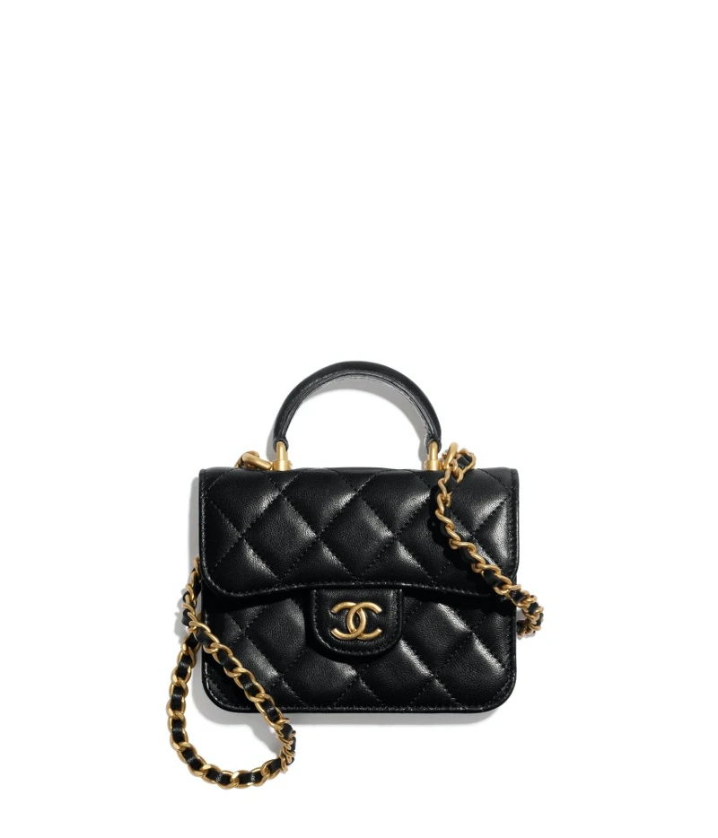 Chanel黑色皮革菱格紋皮穿鍊飾以手把小包，NT56,700