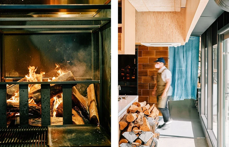 餐廳空間設置了顯眼的明火壁爐。