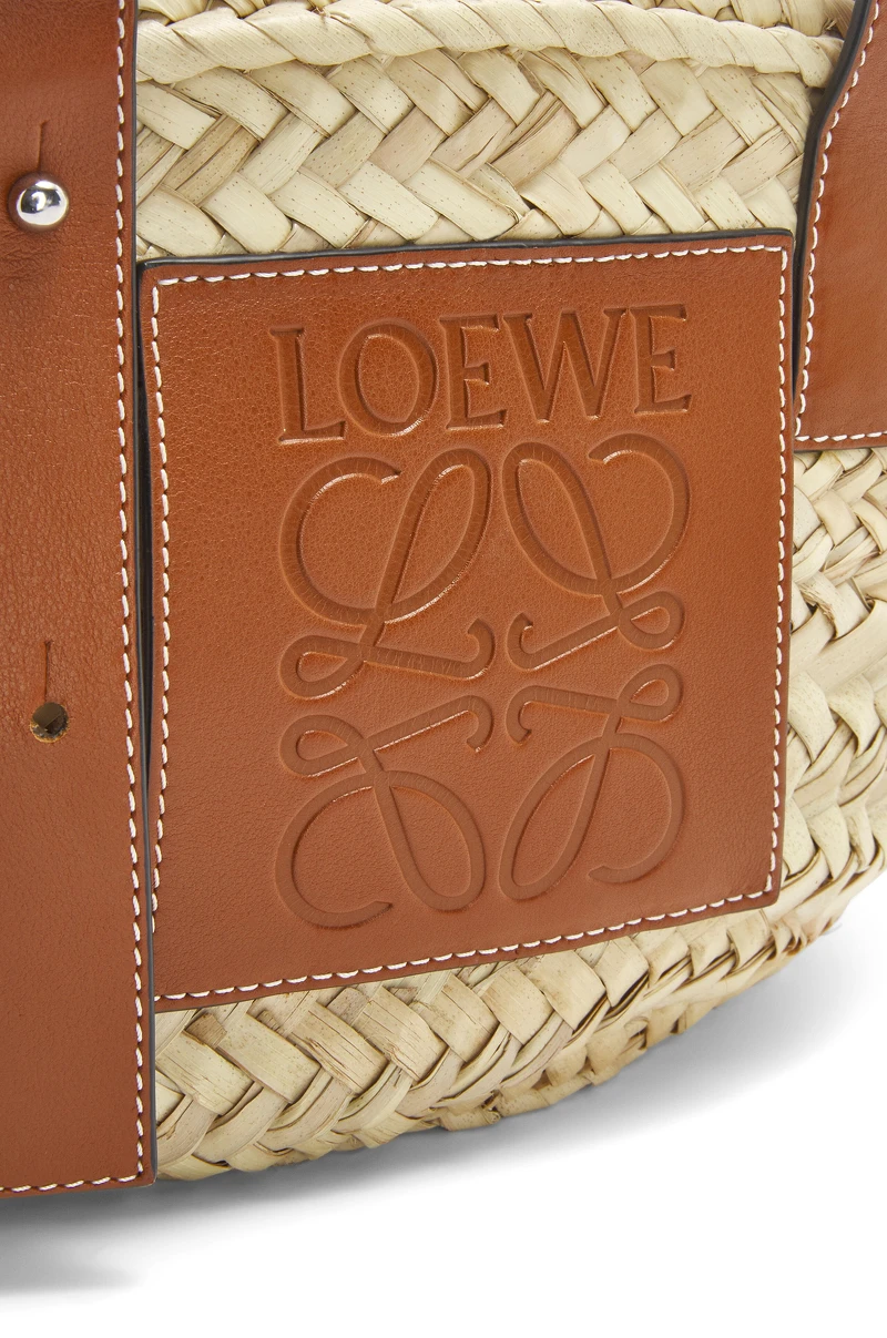 棕櫚葉拼小牛皮織籃,NT18,000 棕櫚葉拼小牛皮織籃,NT18,000