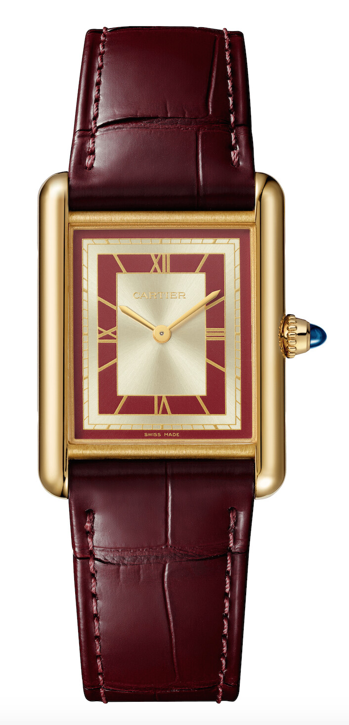 Tank Louis Cartier腕錶，大型款 黃K金，手動上鍊機械機芯，紅色及珠光錶盤，半啞光深紅色鱷魚皮錶帶。 參考價格約NT$ 405,000