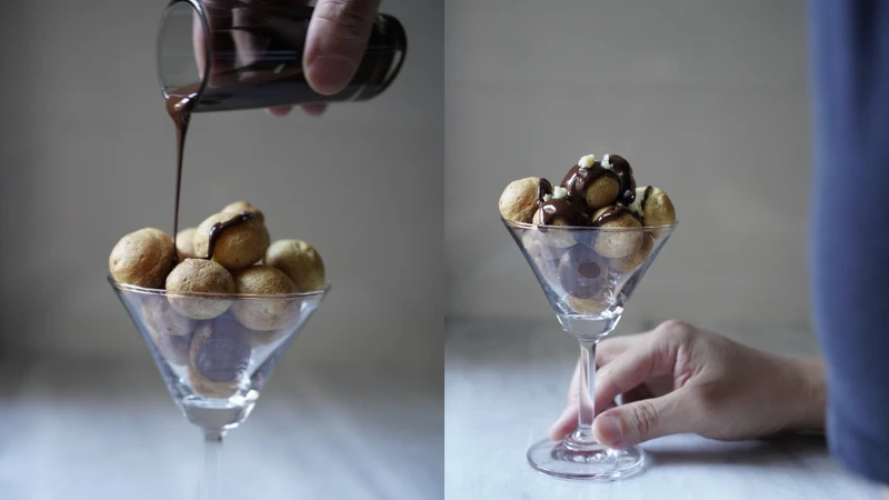 將融化的巧克力醬淋在出爐後的小泡芙上，就完成了。圖/宅時尚甜點by大口心心。