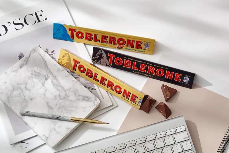 TOBLERONE瑞士三角牛奶巧克力、瑞士三角黑巧克力、瑞士三角脆杏仁巧克力 TOBLERONE瑞士三角牛奶巧克力、瑞士三角黑巧克力、瑞士三角脆杏仁巧克力