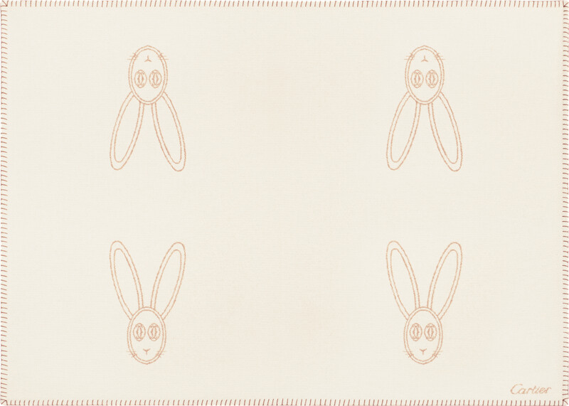 Cartier Baby米色兔子毛毯 美麗諾羊毛和喀什米爾羊毛，點綴兔子圖案。 另有粉色蝴蝶圖案及藍色熊貓圖案可供選擇。 參考價格約NT$ 27,600