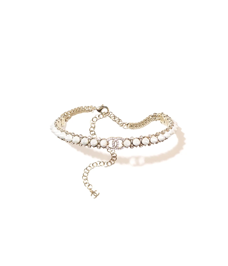 金屬水晶鑲飾象牙白高級樹脂頸鍊，NT$63,800