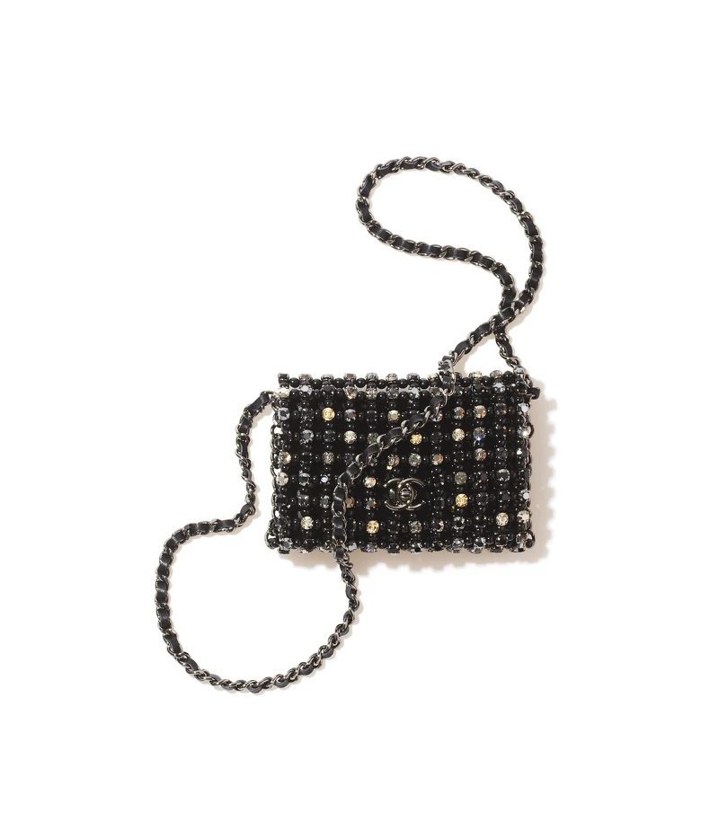 黑色皮革水晶鑲飾幻象珍珠皮穿鍊肩背包,NT379,200 黑色皮革水晶鑲飾幻象珍珠皮穿鍊肩背包,NT379,200