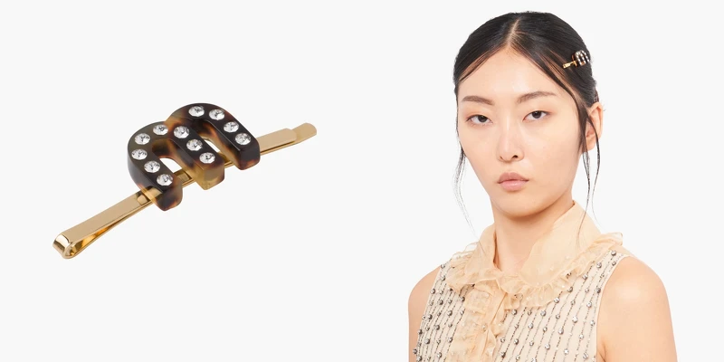 Miu Miu M字髮夾,NT$9,000 Miu Miu M字髮夾,NT$9,000