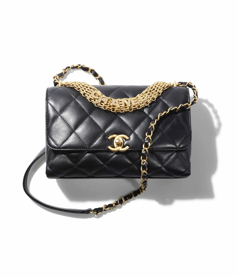 黑色皮革菱格紋金屬水晶鑲飾CHANEL字樣肩背包，NT182,700