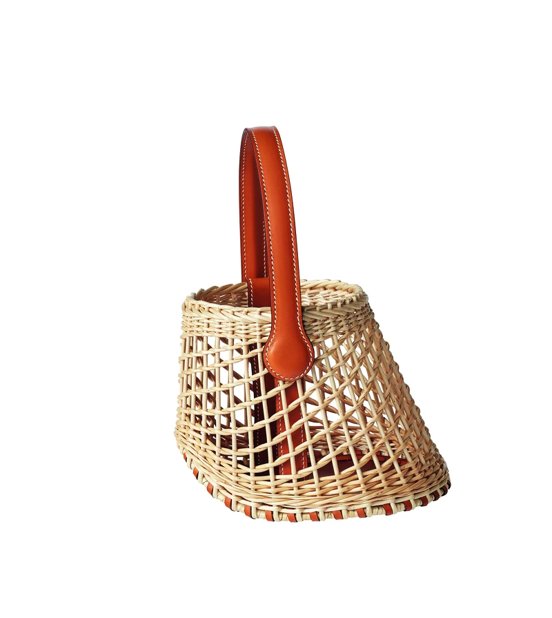 Hermès 小牛皮與柳條編織材質提包,NT195,300。 Hermès 小牛皮與柳條編織材質提包,NT195,300。