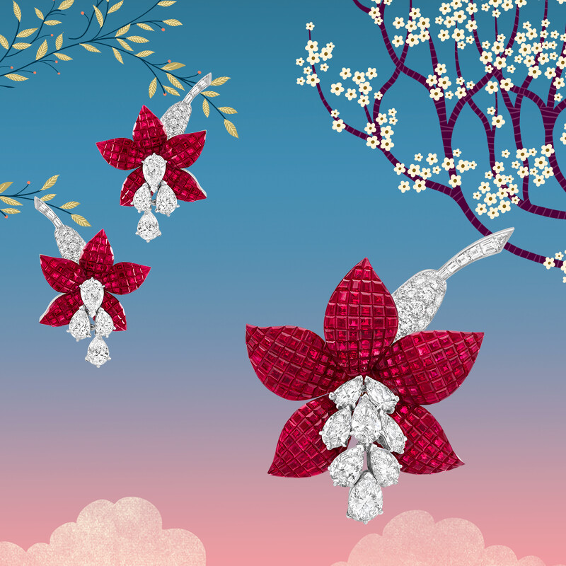 Fuschia胸針,鉑金,白K金,玫瑰金,傳統隱密式鑲嵌紅寶石與鑽石。 Fuschia胸針,鉑金,白K金,玫瑰金,傳統隱密式鑲嵌紅寶石與鑽石。