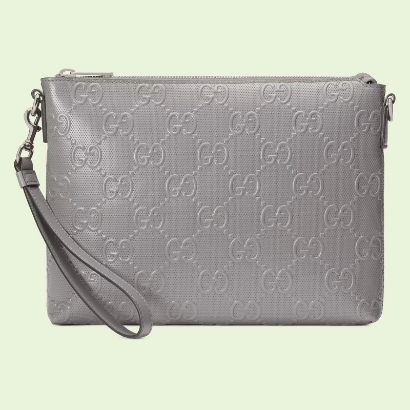 Gucci灰色GG 緹花皮革手拿包,NT 46,100 Gucci灰色GG 緹花皮革手拿包,NT 46,100