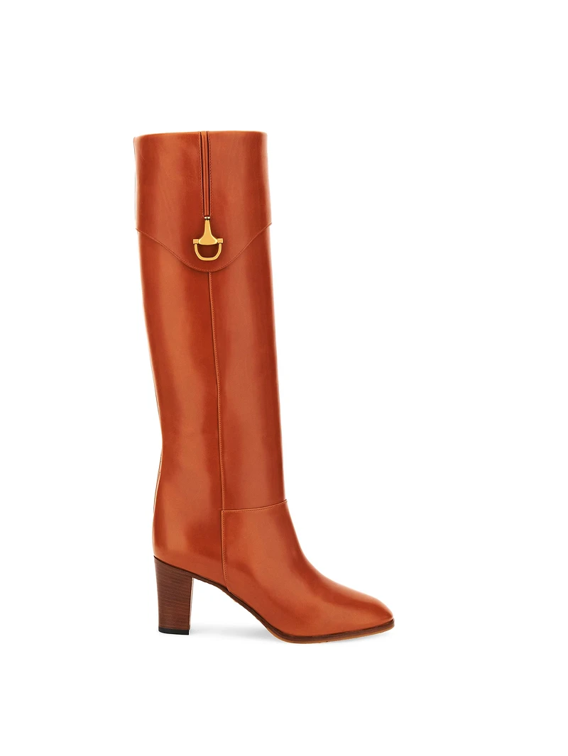 橘色皮革高跟靴子, $57,200 橘色皮革高跟靴子, $57,200