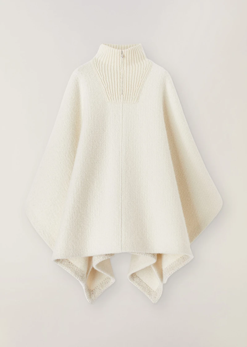 Loro Piana 針織緄邊披風,NT250,000。 Loro Piana 針織緄邊披風,NT250,000。