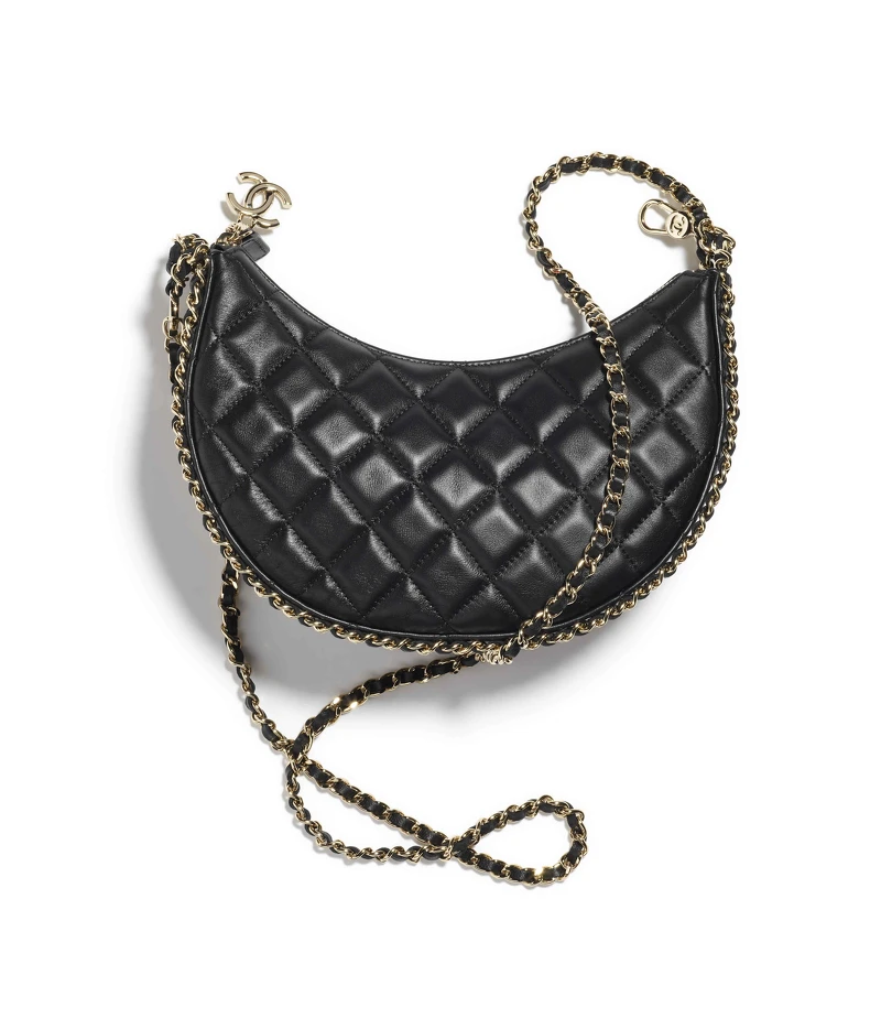 黑色皮革菱格紋皮穿鍊肩背包,NT 140,300 黑色皮革菱格紋皮穿鍊肩背包,NT 140,300