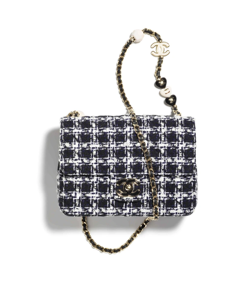 黑白斜紋軟呢格紋皮穿鍊肩背包,NT 163,700 黑白斜紋軟呢格紋皮穿鍊肩背包,NT 163,700