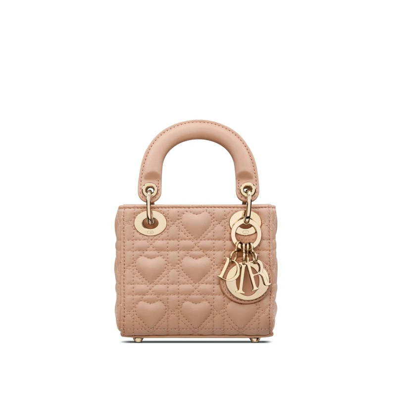 Lady Dior 玫瑰粉愛心籐格紋羊皮微型提包,NT 110,000 Lady Dior 玫瑰粉愛心籐格紋羊皮微型提包,NT 110,000