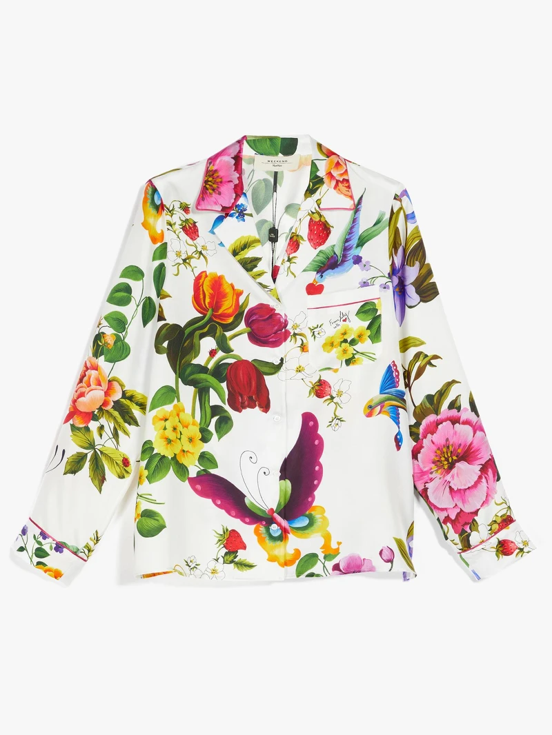 白色印花襯衫,價格店洽。 白色印花襯衫,價格店洽。