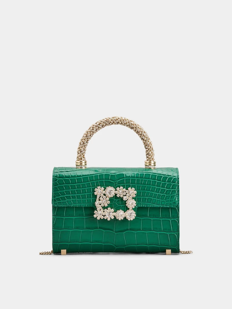 Roger Vivier Flower Jewel 森林綠鱷魚皮鑽飾手提包,NT610,000。 Roger Vivier Flower Jewel 森林綠鱷魚皮鑽飾手提包,NT610,000。