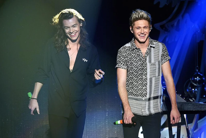Harry Styles (L) and Niall Horan of One Direction perform Harry Styles (L) and Niall Horan of One Direction perform