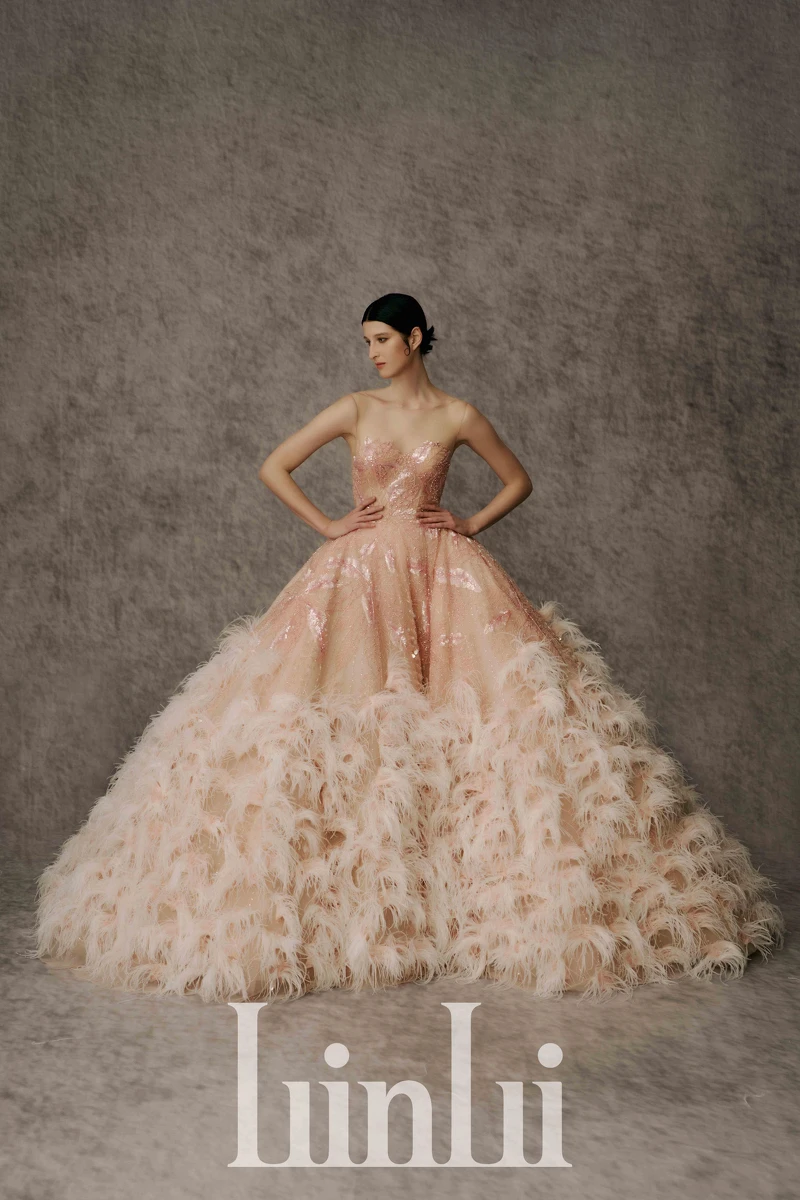 蜜桃粉裸縫珠鑽羽毛禮服