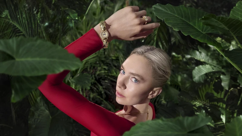 La Panthère雙獸首腕錶(黃K金、石英機芯。)