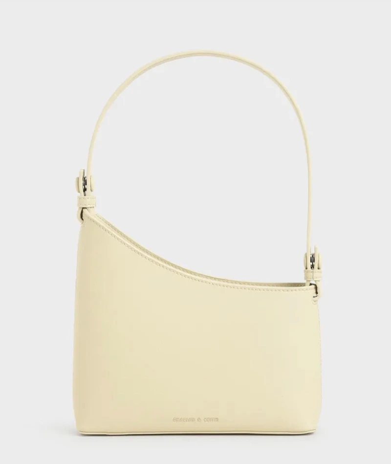 Charles & Keith幾何剪裁手提包NT$1,111。 Charles & Keith幾何剪裁手提包NT$1,111。