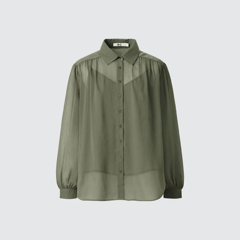 透膚澎袖上衣NT$990。