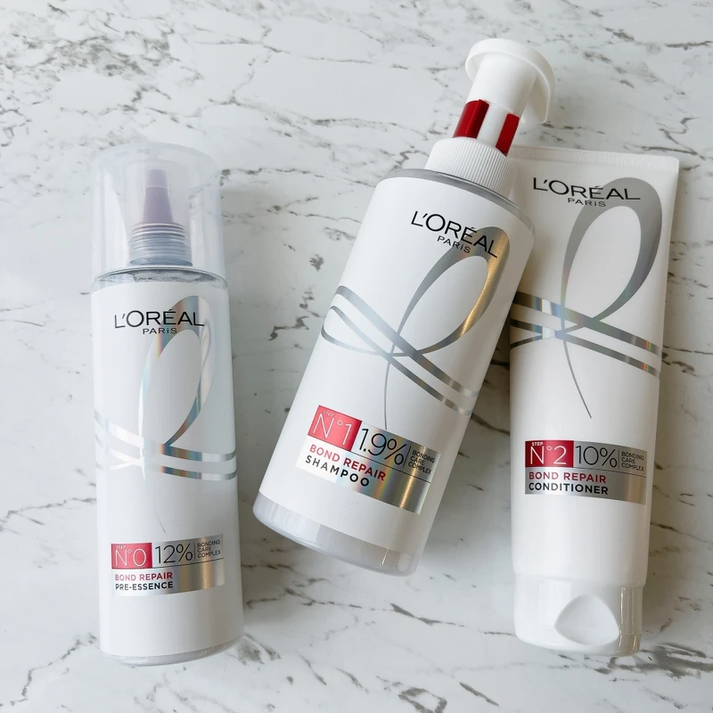 巴黎萊雅髮芯修護強化系列，左起為髮芯修護強化洗前精華、髮芯修護強化洗髮露、髮芯修護強化護髮素，上面的數字代表髮芯修護複合精華含量。