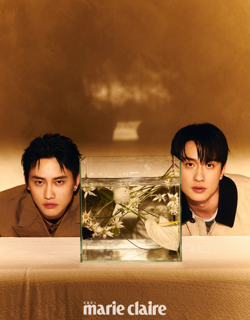 范少勳／黃褐色羊毛西裝外套、灌木叢色棉質襯衫，both by Burberry；藍寶石耳環，Piaget。劉俊謙／沙色黑領外套、灰色短袖上衣，both by Ferragamo。