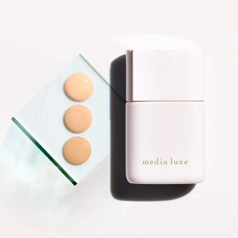 media媚點輕透持效粉底液，NT398