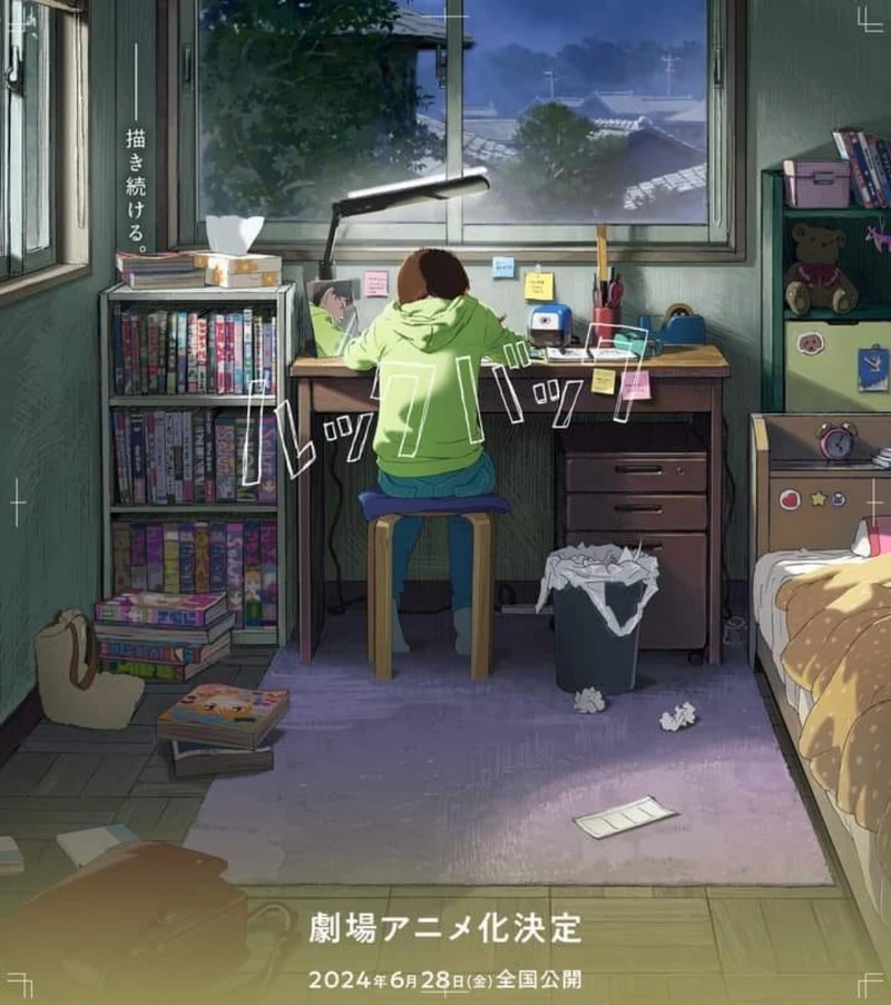 埋頭作畫的背影。