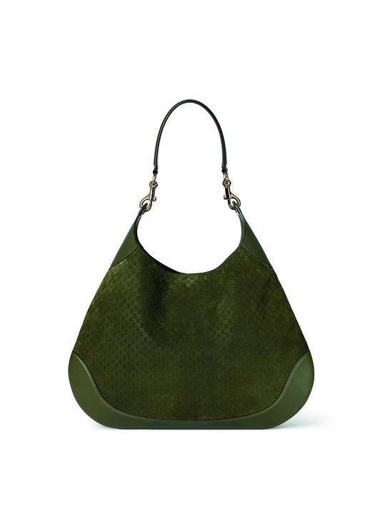 Gucci 2024秋冬亮點之一,肯定是全新包款 B Bag 的推出,名稱中的「B」,指的就是「Body(身體)」,象徵 Gucci B 包款的設計結構巧妙與人體曲線融為一體。