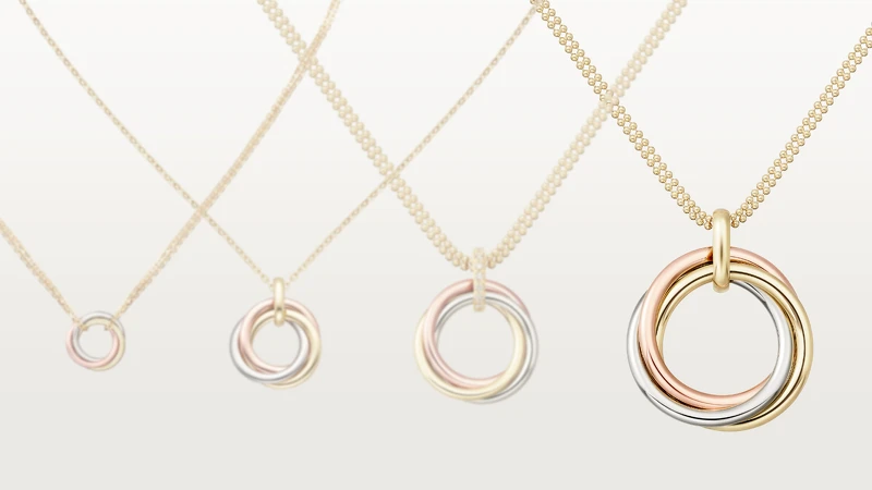 Trinity系列項鍊，18K金、18K白金與玫瑰金。