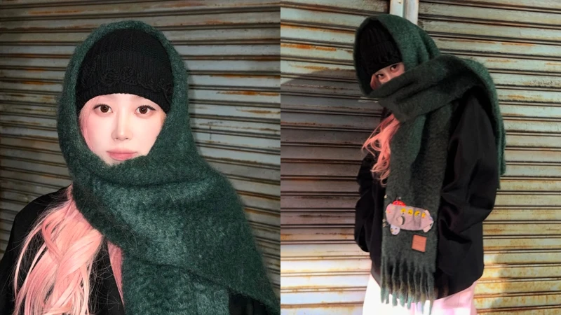 南韓大勢女團aespa Giselle披上最新Loewe馬海毛和羊毛混紡假期系列圍巾,示範可愛毛帽圍法。 南韓大勢女團aespa Giselle披上最新Loewe馬海毛和羊毛混紡假期系列圍巾,示範可愛毛帽圍法。