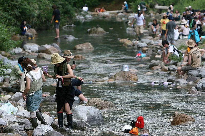 YUZAWA, JAPAN - JULY 26: People spend their time between concerts during the Fuji Rock Festival at Naeba Ski Resort on July 26, 2008 in Yuzawa, Niigata, Japan. (Photo by Kiyoshi Ota/Getty Images)