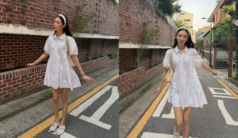 韓國時尚博主Irene Kim身穿娃娃襯衫式白色洋裝，搭配洞洞芭蕾舞鞋