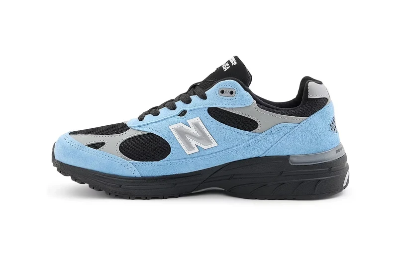 New Balance 993 'Community Blue' 側面展示，可見 ABZORB 與 ACTEVA 中底科技
