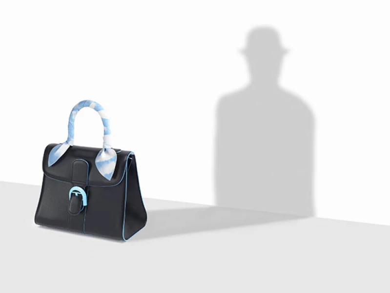 顛覆傳統的精緻工藝 Delvaux 帶你遨遊畫家馬格利特的超現實夢境