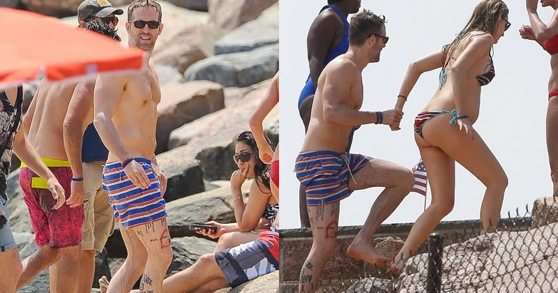 原來也是刺青狂!萊恩雷諾斯與嬌妻海邊曬恩愛 腿上刺青曝光